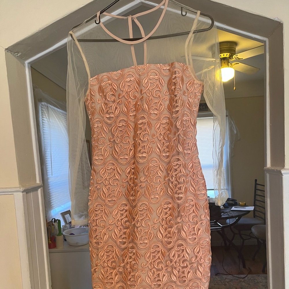 Knee length rose colored dress